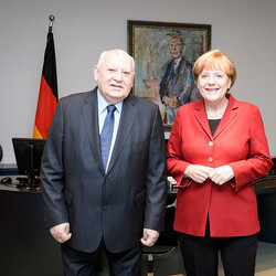 С канцлером Германии Ангелой Меркель, 2014 год. Фото: Getty Images
